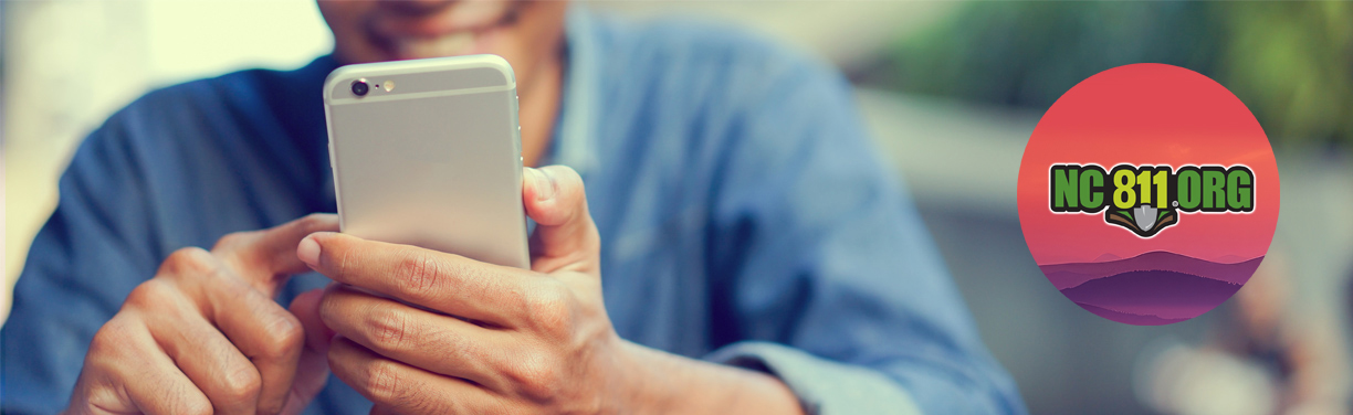 Man using his mobile phone and scrolling with a finger