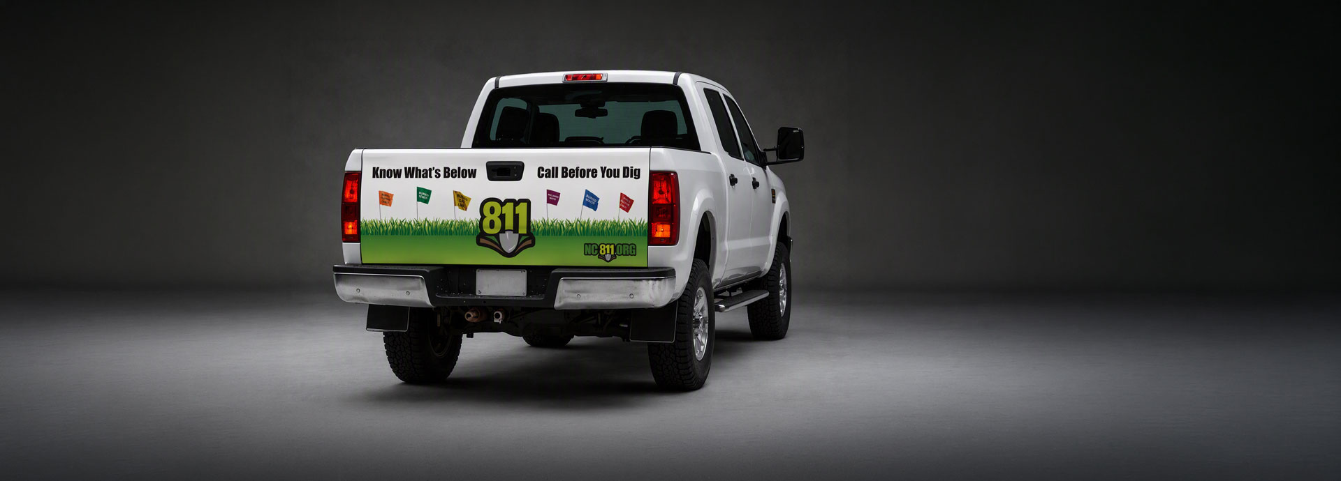 truck with 811 tailgate wrap